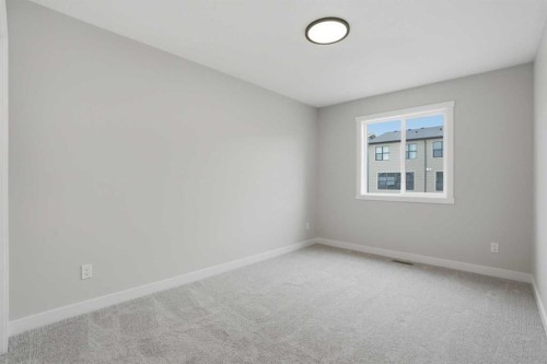 72 Buffaloberry Manor Se, Calgary, AB - Indoor Photo Showing Other Room