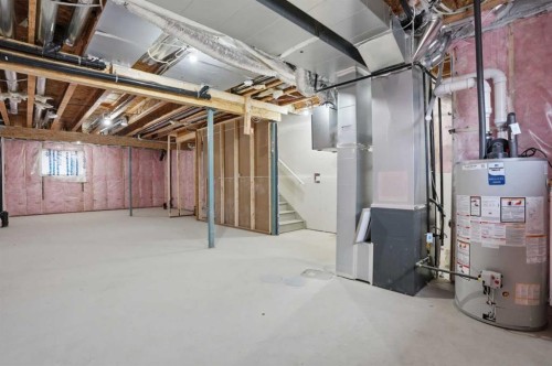 72 Buffaloberry Manor Se, Calgary, AB - Indoor Photo Showing Basement