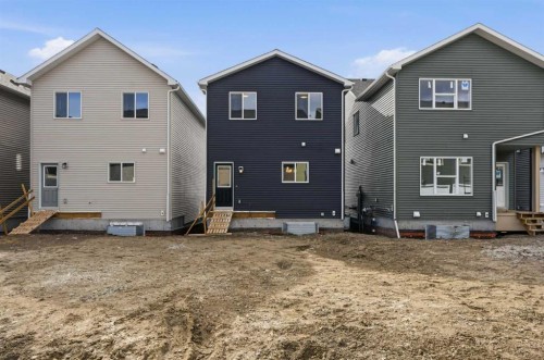 72 Buffaloberry Manor Se, Calgary, AB - Outdoor With Exterior