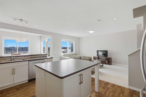 1456 Livingston Way Ne, Calgary, AB - Indoor Photo Showing Kitchen With Double Sink