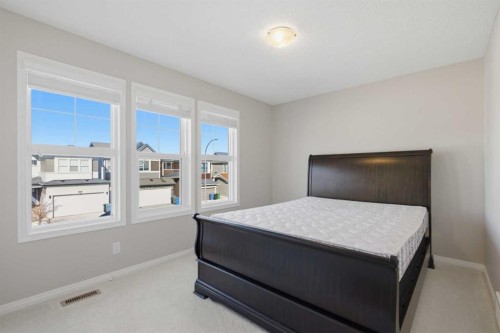 1456 Livingston Way Ne, Calgary, AB - Indoor Photo Showing Bedroom