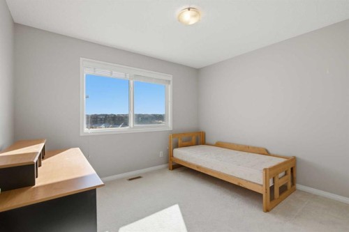1456 Livingston Way Ne, Calgary, AB - Indoor Photo Showing Bedroom