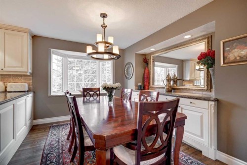 103 Pump Hill Place Sw, Calgary, AB - Indoor Photo Showing Dining Room
