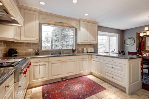103 Pump Hill Place Sw, Calgary, AB - Indoor Photo Showing Kitchen