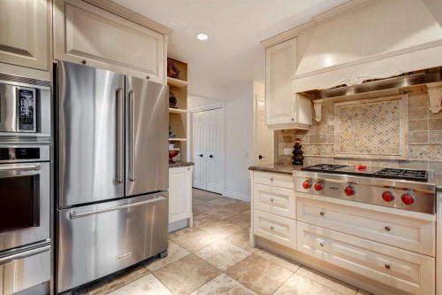 103 Pump Hill Place Sw, Calgary, AB - Indoor Photo Showing Kitchen With Upgraded Kitchen