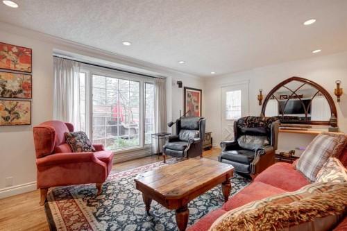 103 Pump Hill Place Sw, Calgary, AB - Indoor Photo Showing Living Room