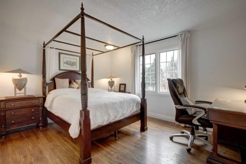 103 Pump Hill Place Sw, Calgary, AB - Indoor Photo Showing Bedroom