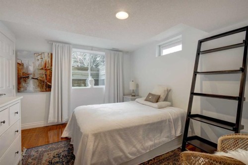 103 Pump Hill Place Sw, Calgary, AB - Indoor Photo Showing Bedroom