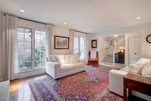 103 Pump Hill Place Sw, Calgary, AB - Indoor Photo Showing Living Room