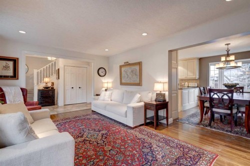103 Pump Hill Place Sw, Calgary, AB - Indoor Photo Showing Living Room