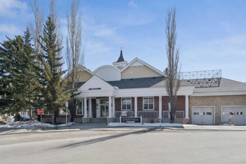 106-3650 Marda Link Sw, Calgary, AB - Outdoor With Deck Patio Veranda With Facade