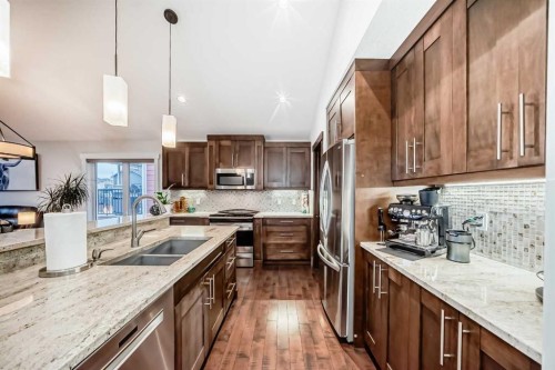3 Cimarron Springs Circle, Okotoks, AB - Indoor Photo Showing Kitchen With Double Sink With Upgraded Kitchen