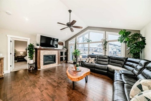 3 Cimarron Springs Circle, Okotoks, AB - Indoor Photo Showing Living Room With Fireplace