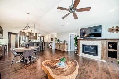 3 Cimarron Springs Circle, Okotoks, AB - Indoor Photo Showing Living Room With Fireplace