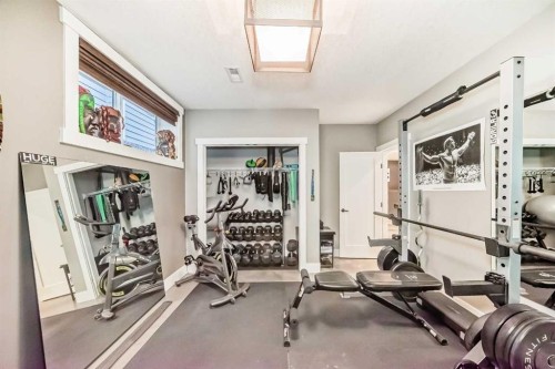 3 Cimarron Springs Circle, Okotoks, AB - Indoor Photo Showing Gym Room