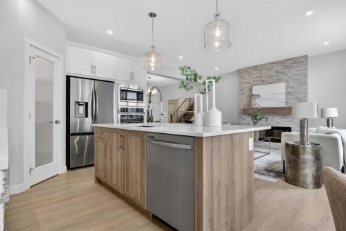 67 Versant Way Sw, Calgary, AB - Indoor Photo Showing Kitchen With Stainless Steel Kitchen With Upgraded Kitchen