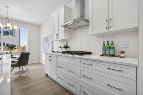 67 Versant Way Sw, Calgary, AB - Indoor Photo Showing Kitchen With Upgraded Kitchen