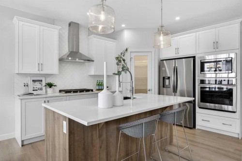 67 Versant Way Sw, Calgary, AB - Indoor Photo Showing Kitchen With Stainless Steel Kitchen With Upgraded Kitchen