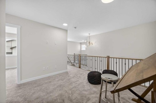 67 Versant Way Sw, Calgary, AB - Indoor Photo Showing Other Room