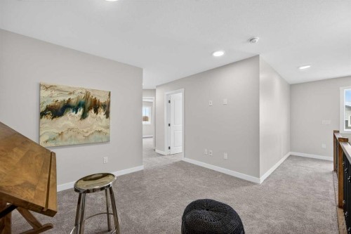 67 Versant Way Sw, Calgary, AB - Indoor Photo Showing Other Room