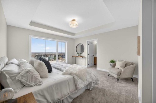 67 Versant Way Sw, Calgary, AB - Indoor Photo Showing Bedroom