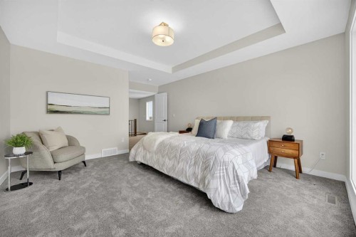 67 Versant Way Sw, Calgary, AB - Indoor Photo Showing Bedroom