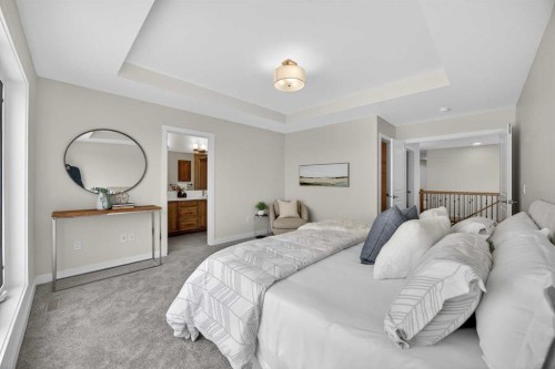 67 Versant Way Sw, Calgary, AB - Indoor Photo Showing Bedroom