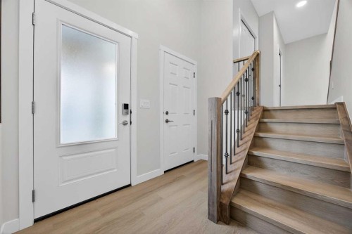 67 Versant Way Sw, Calgary, AB - Indoor Photo Showing Other Room