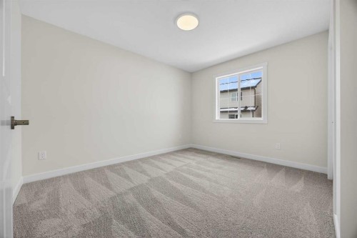 67 Versant Way Sw, Calgary, AB - Indoor Photo Showing Other Room