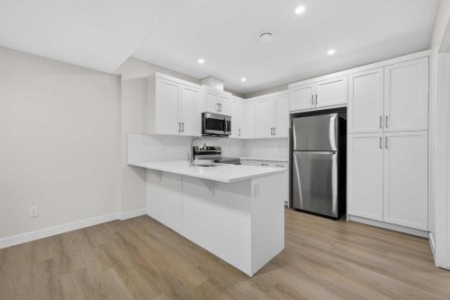 67 Versant Way Sw, Calgary, AB - Indoor Photo Showing Kitchen