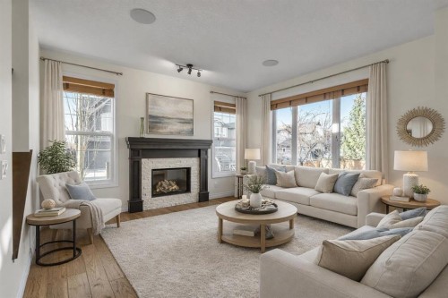 8 Legacy Terrace Se, Calgary, AB - Indoor Photo Showing Living Room With Fireplace
