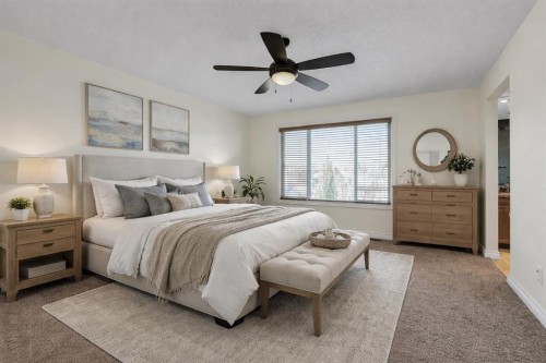 8 Legacy Terrace Se, Calgary, AB - Indoor Photo Showing Bedroom