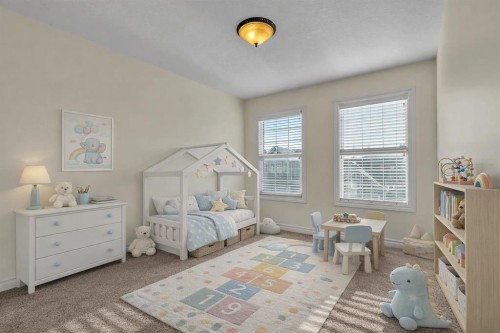 8 Legacy Terrace Se, Calgary, AB - Indoor Photo Showing Bedroom