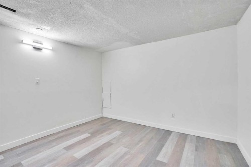 26 Falmead Bay Ne, Calgary, AB - Indoor Photo Showing Other Room