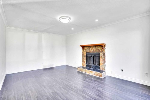 26 Falmead Bay Ne, Calgary, AB - Indoor With Fireplace