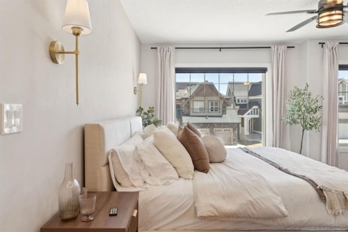 206 Riviera View, Cochrane, AB - Indoor Photo Showing Bedroom