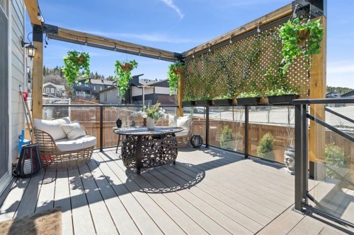 206 Riviera View, Cochrane, AB - Outdoor With Deck Patio Veranda With Exterior