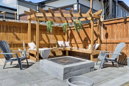 206 Riviera View, Cochrane, AB - Outdoor With Deck Patio Veranda With Exterior