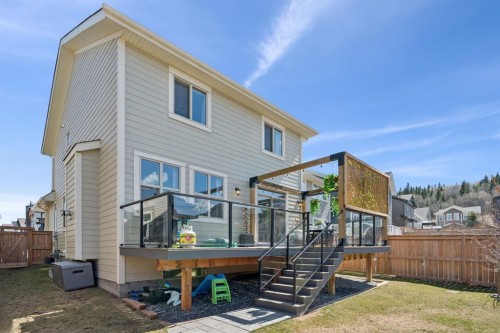 206 Riviera View, Cochrane, AB - Outdoor With Deck Patio Veranda