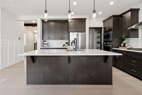 206 Riviera View, Cochrane, AB - Indoor Photo Showing Kitchen With Upgraded Kitchen