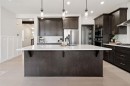206 Riviera View, Cochrane, AB  - Indoor Photo Showing Kitchen With Upgraded Kitchen 