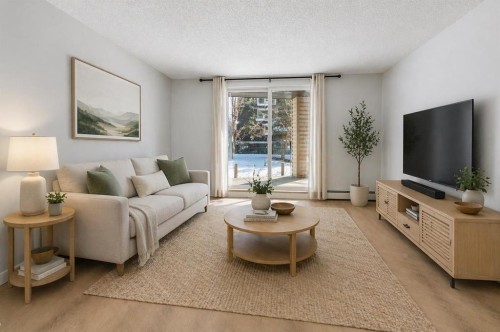 3109-4975 130 Avenue Se, Calgary, AB - Indoor Photo Showing Living Room