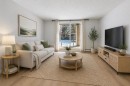 3109-4975 130 Avenue Se, Calgary, AB  - Indoor Photo Showing Living Room 