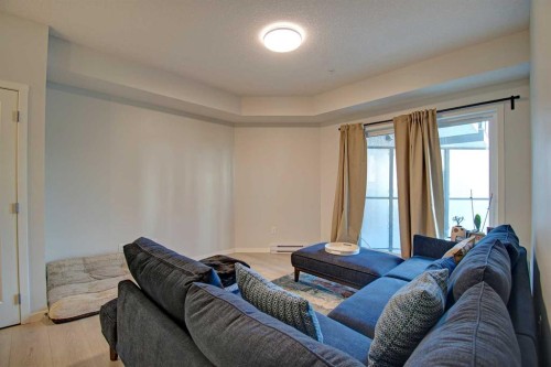 5119-20295 Seton Way Se, Calgary, AB - Indoor Photo Showing Living Room