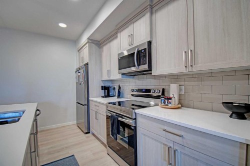 5119-20295 Seton Way Se, Calgary, AB - Indoor Photo Showing Kitchen With Stainless Steel Kitchen