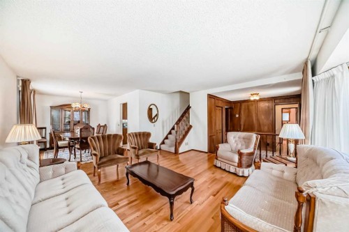 183 Dalcastle Way Nw, Calgary, AB - Indoor Photo Showing Living Room