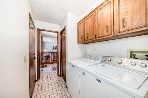 183 Dalcastle Way Nw, Calgary, AB - Indoor Photo Showing Laundry Room