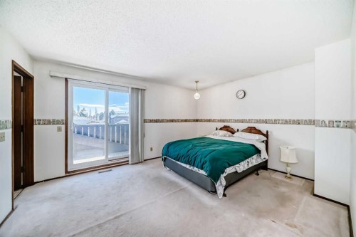 183 Dalcastle Way Nw, Calgary, AB - Indoor Photo Showing Bedroom