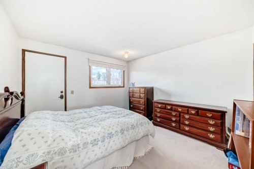 183 Dalcastle Way Nw, Calgary, AB - Indoor Photo Showing Bedroom
