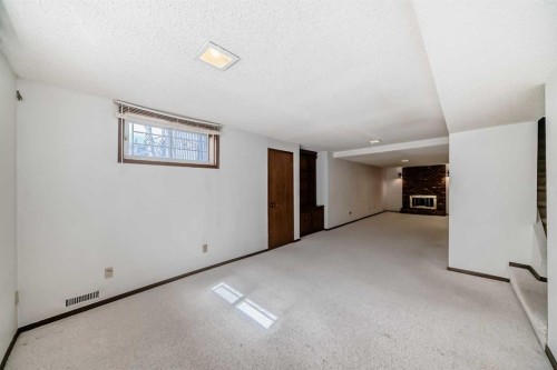 183 Dalcastle Way Nw, Calgary, AB - Indoor Photo Showing Other Room